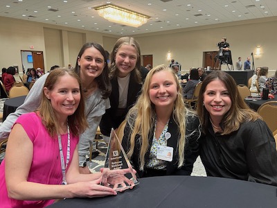 Inaugural fellow, Kathleen Zacherl, MD (far left), Maddie Morello, Manager of Quality and Safety (second from right) and team with the Kirkland Award