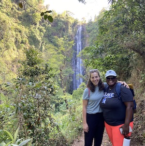 Emily Herfel, DO, MSc-GH, with Ravyn Njagu, MD