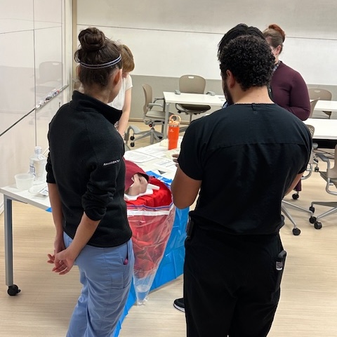 Students training in OB simulation lab 