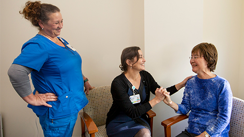 Patient, nurse and doctor talking
