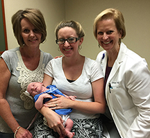 Doctor with family in clinic.