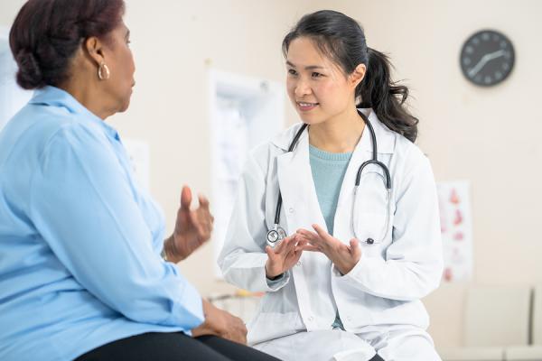 Doctor talking to patient