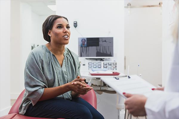 Patient looking at doctor