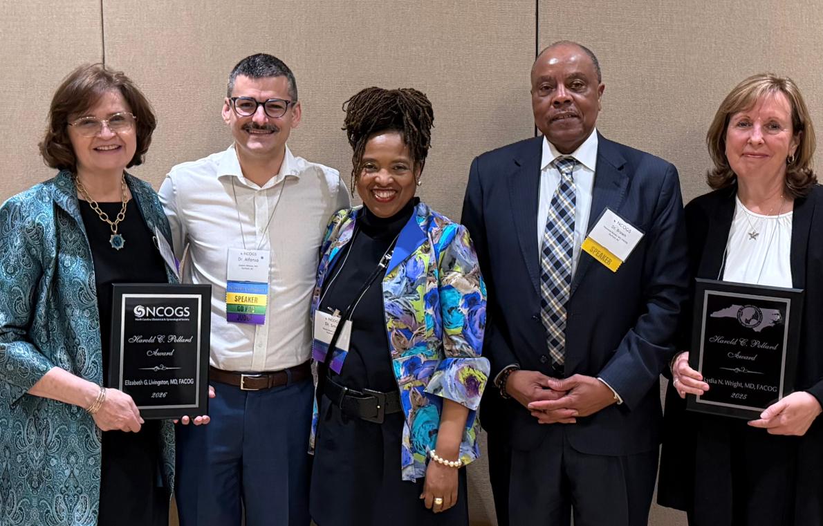 Group of people with award recipient.