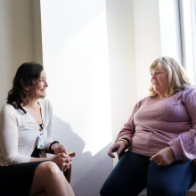 Dr. Secord talks with a patient