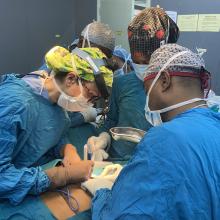 Surgeons operating