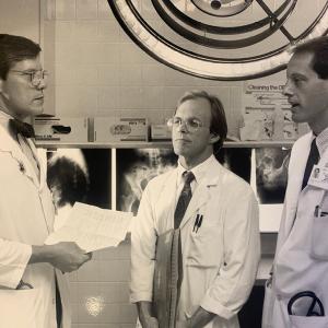 Daniel Clarke-Pearson, MD, then chief of the Division of Gynecologic Oncology (left), consults with John Soper, MD (middle), and Andrew Berchuck, MD (right), in 1990.