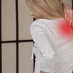 Woman with painful shoulder